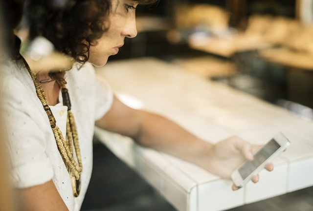 Around one third of shoppers in Britain and Europe use their mobile phone to save money on grocery bills